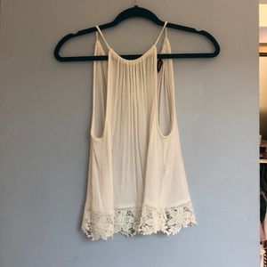 Divides white flowy tank top
